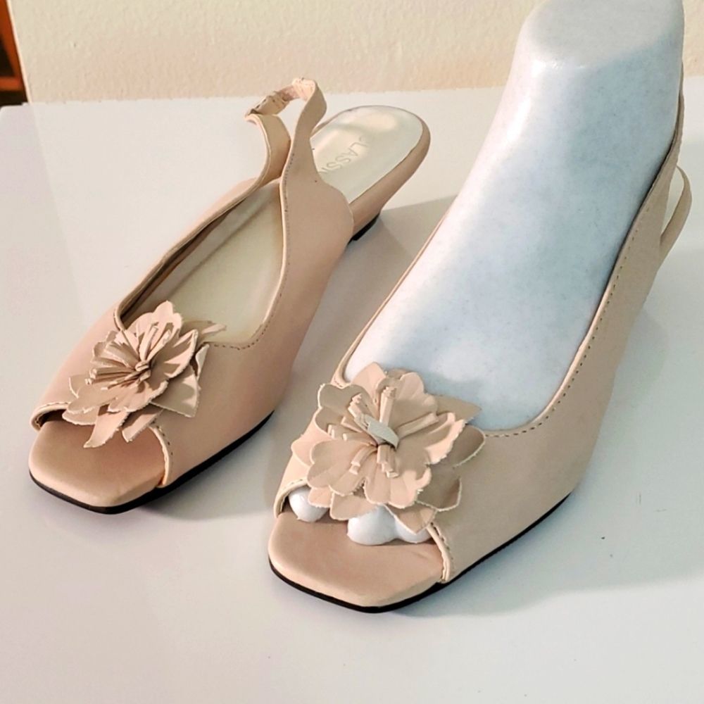 Clasique, cream color sling back open toe. 8